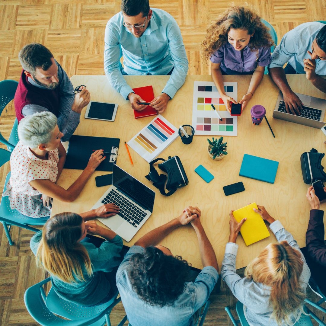 A leadership team collaborating around a table